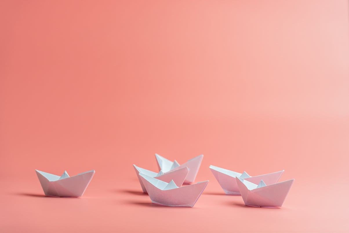 Origami Paper Boats on Pink Background